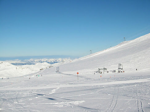 Die Piste hinunter Fotos